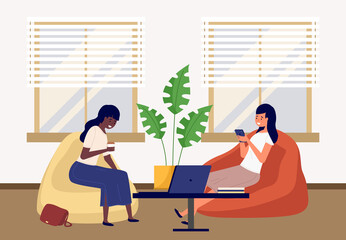 Fototapeta premium Two beautiful friends girls talking friendly while drinking coffee, vector illustration office space. Two employees, colleagues or business women sitting on bag chairs near the table with laptops