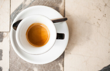Cup of coffee on the marble table