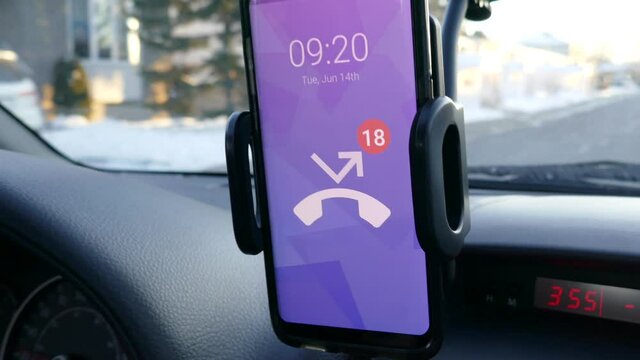 Smartphone Showing Many Missed Call Notification To The Driver Of The Car