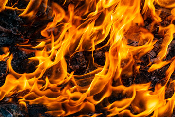 The fire, burning debris, there is no focus. Large burning fire.