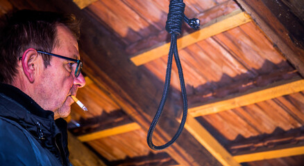 A noose hanging around his neck, a suicide committed, horrific scenes in a dark attic