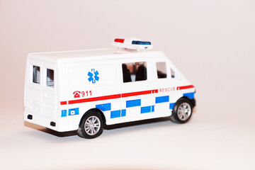 911 rescue toy car on white background, copy space