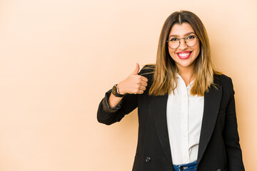 Young indian business woman isolated smiling and raising thumb up