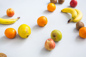 Delicious apples, bananas, kiwis and citrus fruits are waiting to serve as a healthy snack. Fitness food health slimming diet ketogenic juice smoothie conscious nutrition influenzer colorful sweet