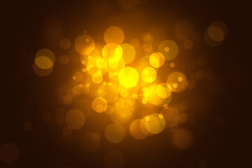 Abstract golden bokeh lights on black background with shiny particles. light gold effect image