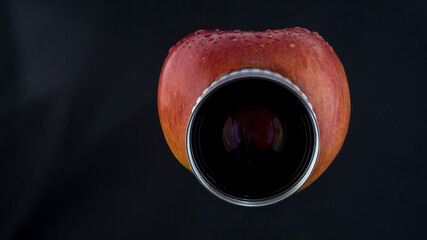 Apple fruit with lens and water drops