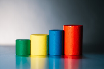 Colorful wooden block sort from high to low using as business and education concept