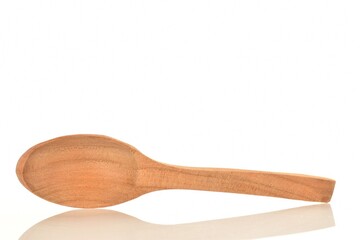 One wooden spatula, for the kitchen, close-up, isolated on white.