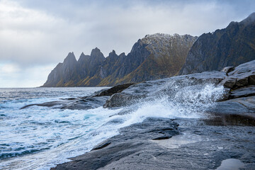 Mountains of Senja surrounded by water in north Norway