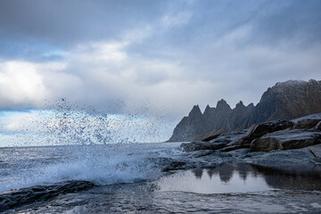 Mountains of Senja surrounded by water in north Norway