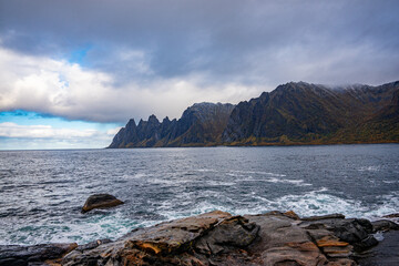 Fototapeta na wymiar Mountains of Senja surrounded by water in north Norway