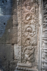 Та Prohm is the temple, it rains in the rainy season.The preserved symbiosis of stone and wood allows us to see Ta Prohm in this form.Bas-relief.(Cambodia, 04.10. 2019).