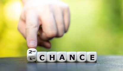 Hand turns dice and changes the expression "1st chance" to "2nd chance".