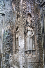 Та Prohm is the temple, it rains in the rainy season.The preserved symbiosis of stone and wood allows us to see Ta Prohm in this form.Bas-relief.(Cambodia, 04.10. 2019).