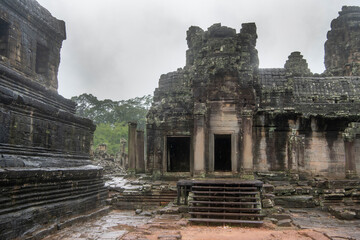  Bayon the central temple of Angkor Thom, late 12th century. It rains in the rainy season. (Cambodia, 04.10. 2019)