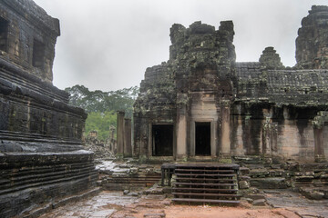  Bayon the central temple of Angkor Thom, late 12th century. It rains in the rainy season....