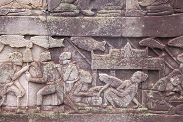  Bayon the central temple of Angkor Thom, late 12th century. Bas-relief. It rains in the rainy...