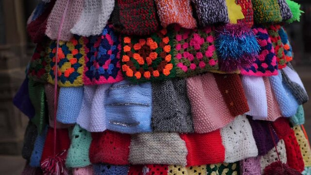 Display of knitted wool patchwork 