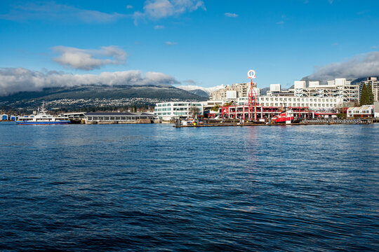 Lonsdale Quay with  The Lions in the background - North Vancouver, BC Canada