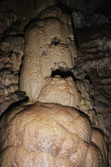 Human image of stalagmites and stalactites in the New Athos cave in Abkhazia. A popular place for...