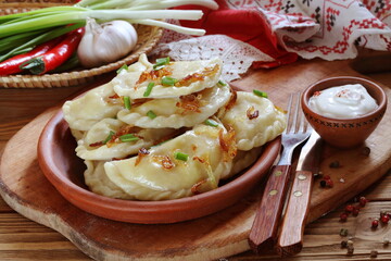 Dumplings with potatoes and sour cream