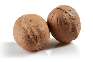 Two walnuts on a white background.
