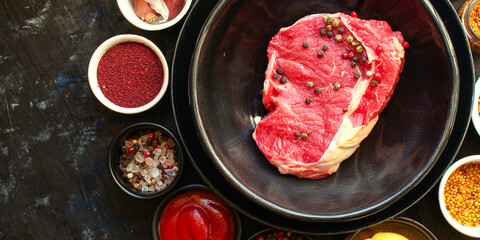 beef steak raw piece of meat second course ready to eat on the table meal snack outdoor top view copy space for text food background rustic image keto or paleo diet