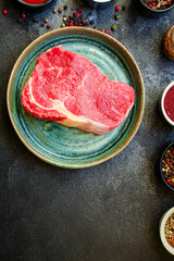 beef steak raw piece of meat second course ready to eat on the table meal snack outdoor top view copy space for text food background rustic image keto or paleo diet
