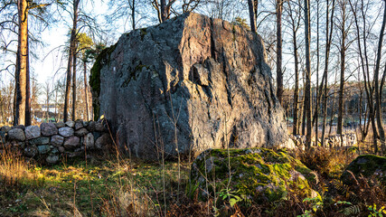 Rocks in the forest Park of Monrepos near Vyborg in Russia