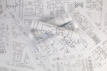 Paper electrical engineering drawings. Work of an electronic engineer.