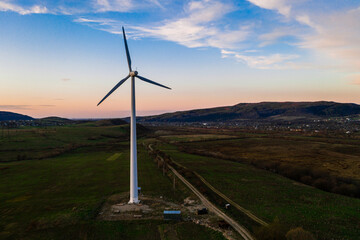 One windmill in the field, production of environmentally friendly energy, the beginning of wind...