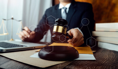 Business and lawyers discussing contract papers with brass scale on desk in office. Law, legal services, advice, justice and law concept  picture with film grain effect