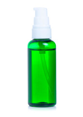 Green cosmetic bottle with dispenser on white background isolation