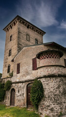 Fototapeta na wymiar Castello Quistini or Palazzo Porcellaga, the castle of Rovato, made of stones from Sarnico, in the Franciacorta region, province of Brescia, Lombardy, Italy