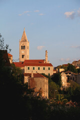 Sunset in Lastovo, small town on island Lastovo, Croatia. Traditional Mediterranean houses and historical church.