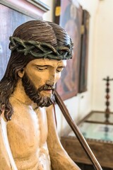 Russia, Rostov, July 2020. An ancient wooden figure of Jesus in the museum.