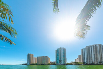 Obraz na płótnie Canvas Sun shining over beautiful Miami Riverwalk