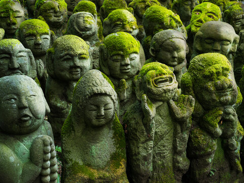 Buddhist rakan stone statues at the Otagi Nenbutsu-ji temple in Arashiyama, Kyoto, Japan