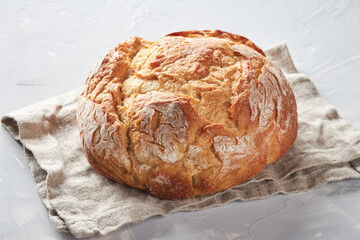 White bread made from wheat flour, concrete background