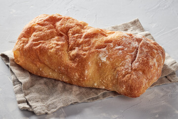 White bread made from wheat flour, concrete background