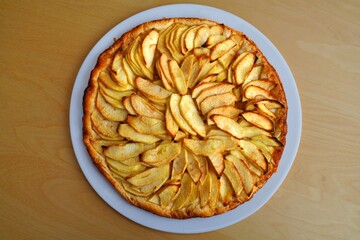 Thin apple tart with sliced apples