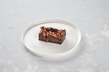 Sweet dessert on a plate, concrete background, for designer