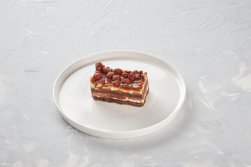 Sweet dessert on a plate, concrete background, for designer