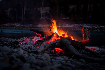 Small fire by the river in the early evening.2021