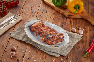 Grilled pork ribs BBQ, wooden background