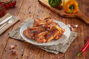 Grilled chicken BBQ, wood background