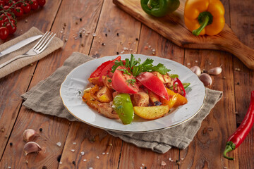 Grilled pork BBQ with fresh vegetables, wooden background