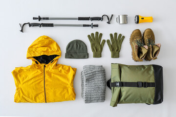 Equipment for hiking on light background