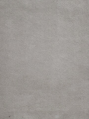 Fragment of a wall with gray decorative grainy plaster. Not seamless texture