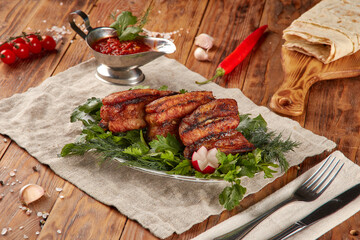 Grilled pork ribs BBQ, wooden background
